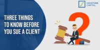 Professional analyzing legal documents before suing a client